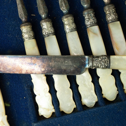 53 - Various silver-plated cutlery, along with an associated oak case.