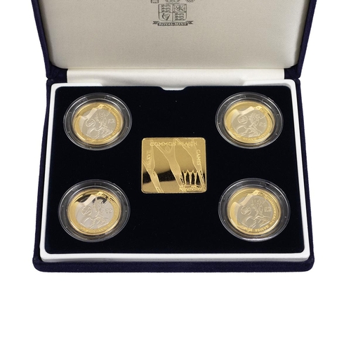 88 - 2002 silver proof Manchester Commonwealth Games four coin £2 set with a commemorative medal in the o... 