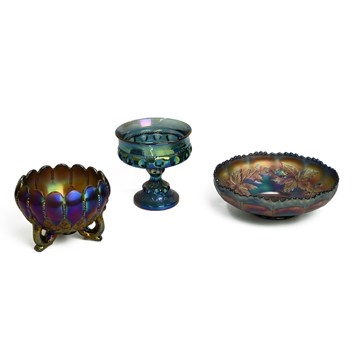 195 - Carnival Glass - mostly amethyst colour - to include Fenton Peacock bowl, Indiana goblet, 2 x Northw... 