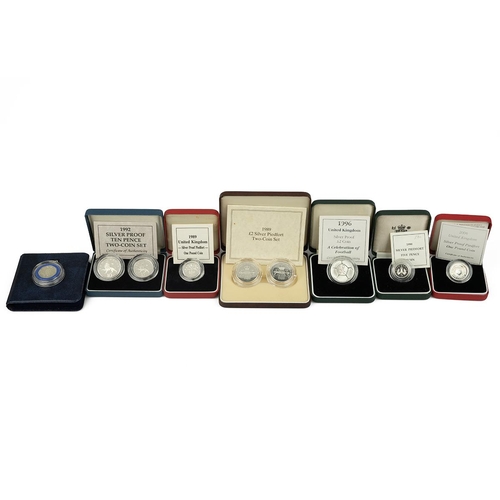 411 - Seven (7) silver proof Royal Mint coins and sets in the original boxes with certificates, including ... 