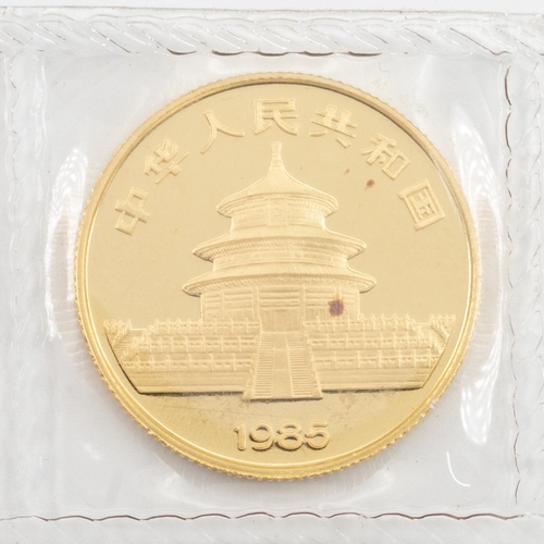 438 - 1985 China sealed 1/4oz 999 gold Panda 25 Yuan BU coin from a low mintage year. Obverse: young panda... 