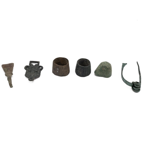 485 - Eleven (11) metal detecting finds, including Roman and medieval rings, beehive thimbles, a brooch an... 