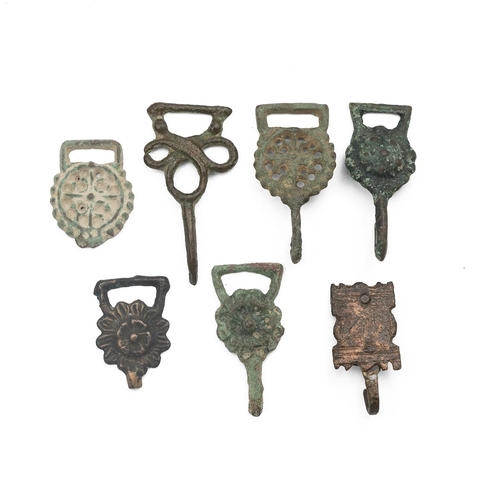 486 - Seven (7) Medieval/Tudor 'openwork' clothing fasteners and hooks, most complete, all metal detecting... 