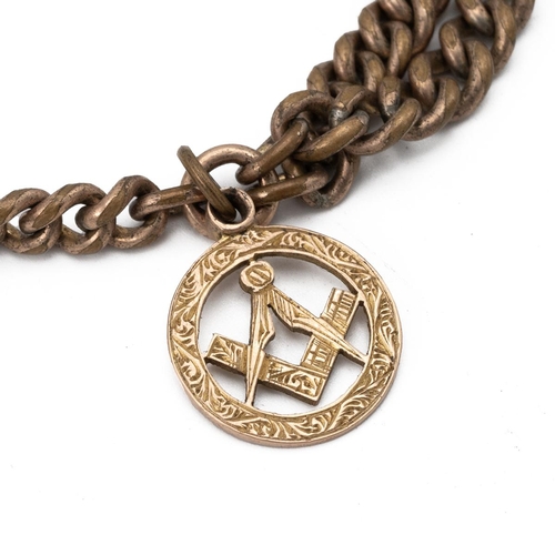 4 - Two 9ct gold masonic charms mounted on a two strand graduating link bracelet with spring ring clasp.