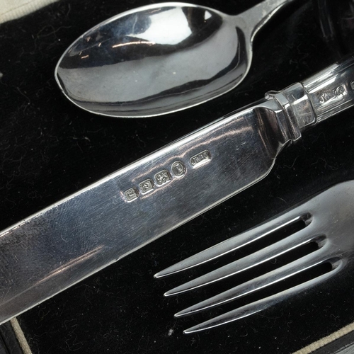 8 - Silver four piece Christening set comprising spoon, fork, knife and napkin ring, hallmarked London 1... 