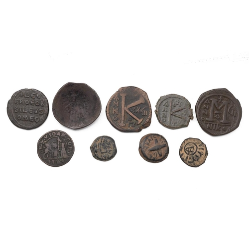 34 - Nine (9) Byzantine and other bronze coins, including Leo VI the Wise, Isaac II, Justinian I, Justin ... 