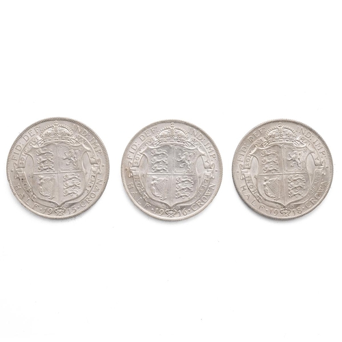 64 - Three (3) George V silver Halfcrowns, including 1915, 1916, and 1918. Grades: VF - Very Fine or bett... 