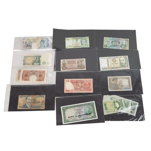 79 - Collection of nine British £1 notes and an assortment of world banknotes from Italy, India, Peru, In... 