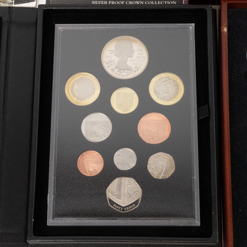 86 - Silver 'Great Britons' coin set along with a proof coin set.