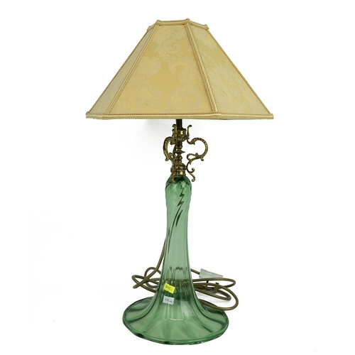 151 - A brass Victorian style table lamp with over hanging glass shade, H51cm. and a green glass table lam... 