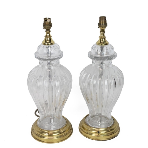 153 - Pair of glass baluster lamps raised on brass stepped bases H45cm together with a glass rope twist la... 