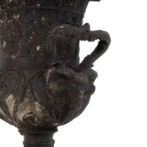 155 - 19th century small bronze twin handle table top urn with all over decoration to the body H21.5 cm.