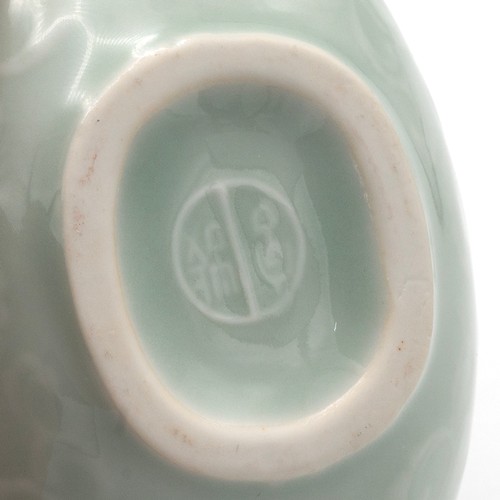 174 - Two mid-late 20th Century Chinese vases the first in celadon green, of moonflask shape decorated wit... 