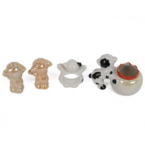 175 - Bonzo the Dog Ceramics, to include a salt & peper shaker, napkin ring and a salt.