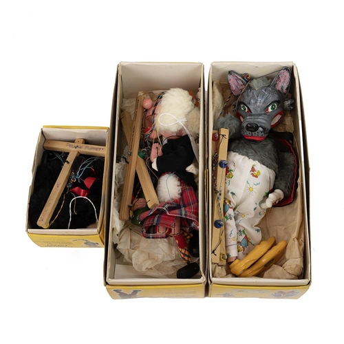 266 - Three boxed Pelham puppets, SM4 Macboozel, SL21 Wolf and A4 Standard Poodle.