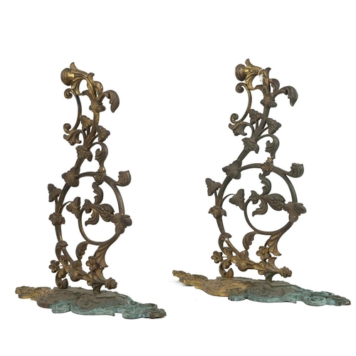 309 - A pair of brass gilded decorative light sconces decorated with ivy and  acanthus the back plates dec... 