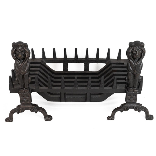 311 - Contemporary cast metal fire grate the basket supported by two fire dogs in the form of a seated lio... 