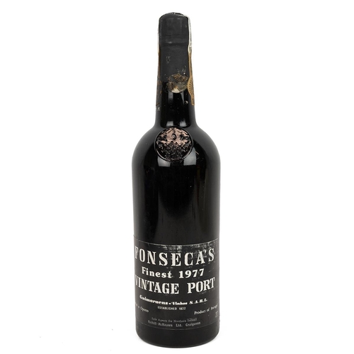 354 - Fonseca Finest vintage port 1977 in a vintage wine gifts presentation case with corkscrew, pourer, d... 