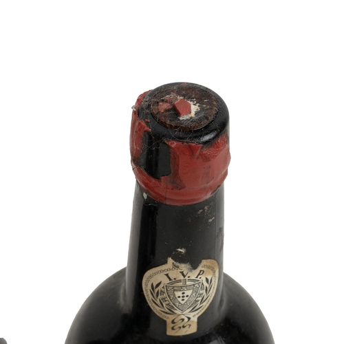 381 - Fonseca Finest vintage port 1977 in a vintage wine gifts presentation case with corkscrew, pourer, d... 