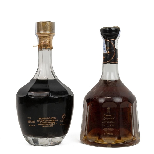 396 - Carlos I Imperial Brandy 70cl 38% alc/vol in decanter bottle with glass stopper in attached leather ... 