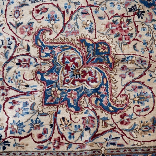 410 - Large early 20th-century Iranian Kerman carpet, decorated with a central medallion on a red and crea... 