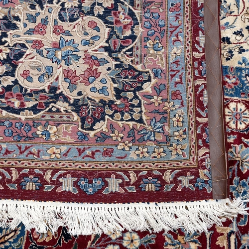 410 - Large early 20th-century Iranian Kerman carpet, decorated with a central medallion on a red and crea... 