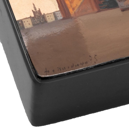 465 - Russian painted lacquered box depicting the Kremlin Moscow Red Square, signed 8.5cm x 13.5cm.