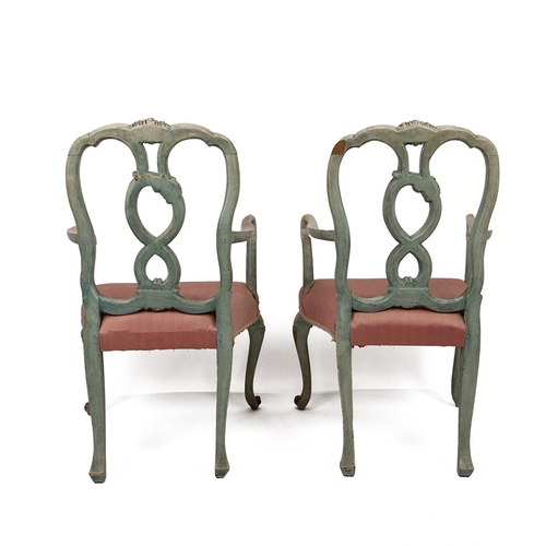 486 - Pair of 20th Century painted open armchairs, each with a red upholstered seat, with a figure of eigh... 