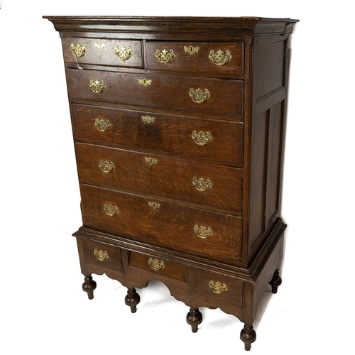 487 - Georgian oak chest on stand with shaped cornice above two short over four long graduating drawers wi... 