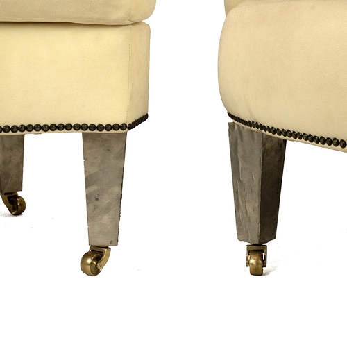 489 - A brushed cotton upholstered elbow chair with stud work decoration and out swept arms H112cm with ma... 