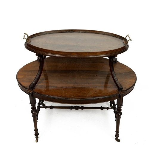 491 - Edwardian Regency style oval rosewood veneered two tiered tray table, the upper brass twin handled g... 