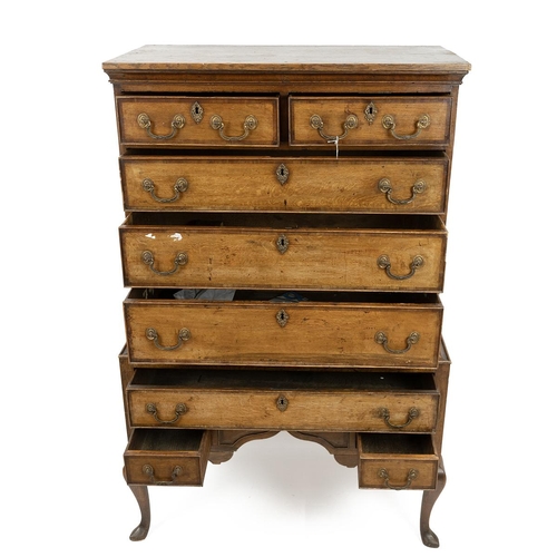 492 - A Georgian inlaid oak chest on stand the drawer fronts with an inlaid boarder and brass drop handles... 