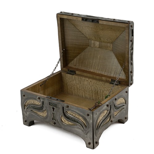 502 - An Art Nouveau Pewter Vellum and Snakeskin sarcophagus shaped casket raised on bracket supports, pen... 