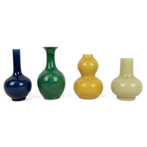 152 - FOUR SMALL CHINESE MONOCHROME VASESIn yellow, green and blue respectively, one in double-gourd shape... 