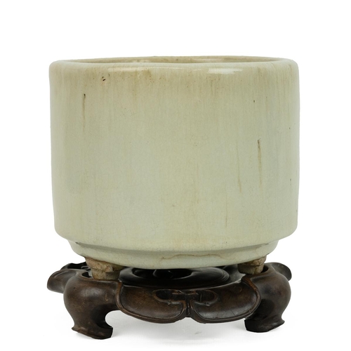 153 - CHINESE CELADON CENSER ON STAND, 19TH CENTURYCylindrical form on squat tripod feet. Hardwood stand i... 