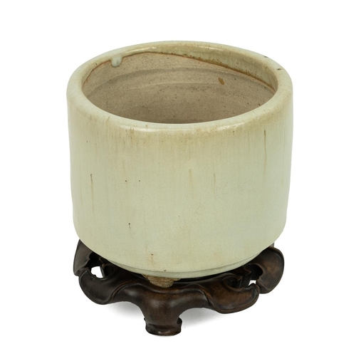 153 - CHINESE CELADON CENSER ON STAND, 19TH CENTURYCylindrical form on squat tripod feet. Hardwood stand i... 