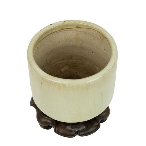 153 - CHINESE CELADON CENSER ON STAND, 19TH CENTURYCylindrical form on squat tripod feet. Hardwood stand i... 