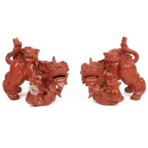 61 - A PAIR OF CHINESE PORCELAIN SUANNI LION FAMILY GROUPS, 20TH CENTURYTerracotta glaze, well modelled, ... 