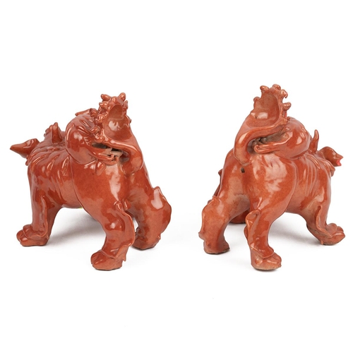 61 - A PAIR OF CHINESE PORCELAIN SUANNI LION FAMILY GROUPS, 20TH CENTURYTerracotta glaze, well modelled, ... 