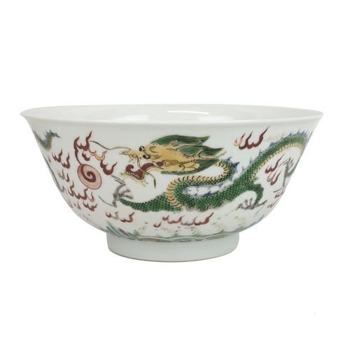 99 - A CHINESE FAMILLE VERTE BOWL, 20TH CENTURYDecorated with two dragons chasing a fireball among flames... 