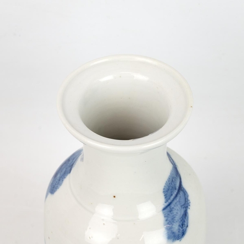 162 - A CHINESE BLUE AND WHITE VASE 20TH CENTURY.Of baluster shape and everted mouth rim, decorated with t... 