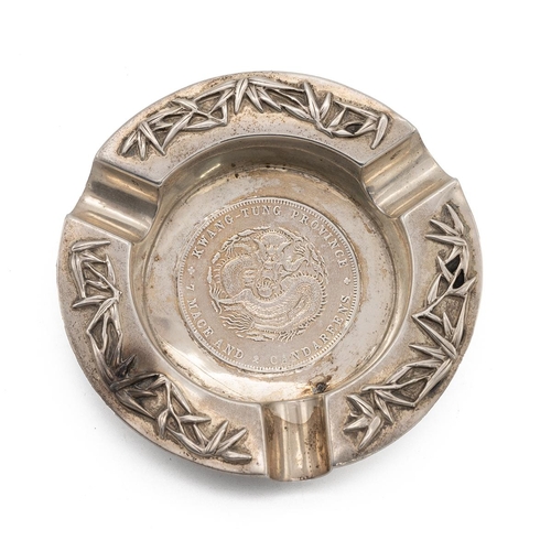 360 - CHINESE SILVER ASHTRAY WITH COIN TO THE WELL.With bamboo decoration to the three section rim and a '... 