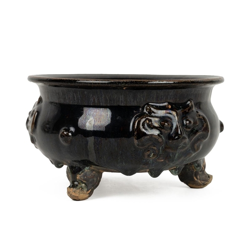 73 - A CHINESE TRIPOD CENSER, 20TH CENTURYBlue green glazed tripod censor with mouldings of mythical beas... 