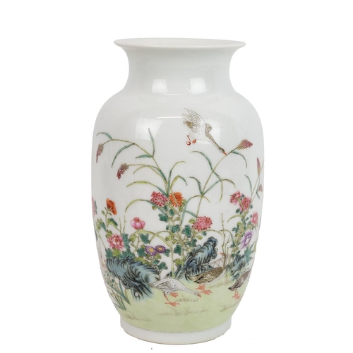 177 - A CHINESE FAMILLE ROSE VASE, 20TH CENTURYOf baluster shape and everted mouth rim, decorated with wil... 