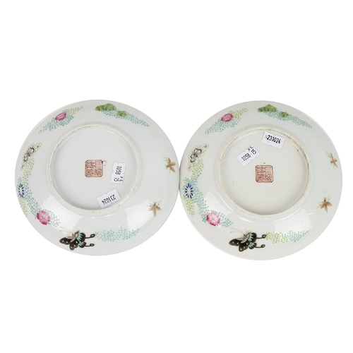 122 - A PAIR OF SMALL CHINESE FAMILLE PLATES, 20TH CENTURYBoth decorated with butterflies and bees flying ... 