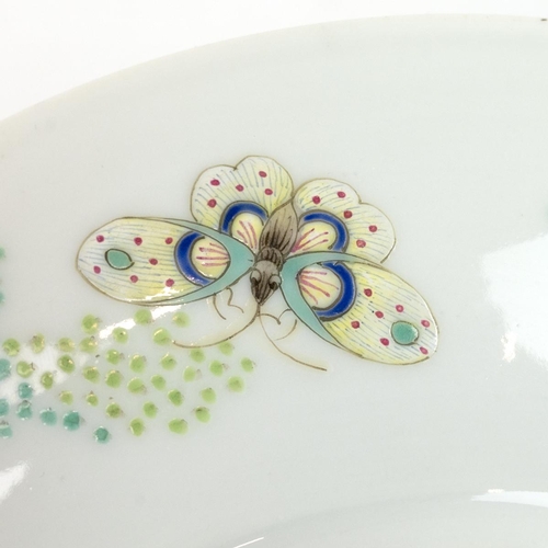 122 - A PAIR OF SMALL CHINESE FAMILLE PLATES, 20TH CENTURYBoth decorated with butterflies and bees flying ... 