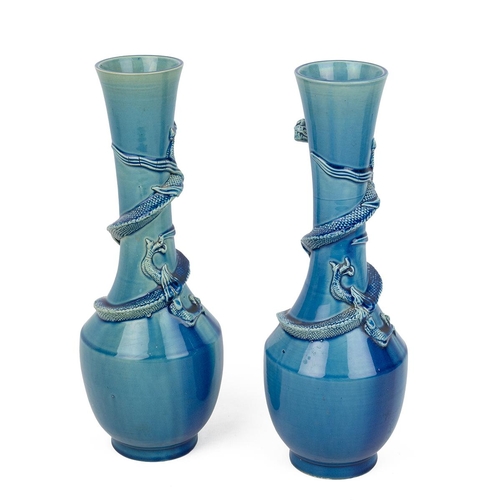 181 - A PAIR OF CHINESE VASES WITH DRAGONS, 19TH CENTURYTurquoise blue glazed baluster form vases with tal... 