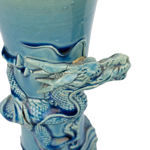 181 - A PAIR OF CHINESE VASES WITH DRAGONS, 19TH CENTURYTurquoise blue glazed baluster form vases with tal... 