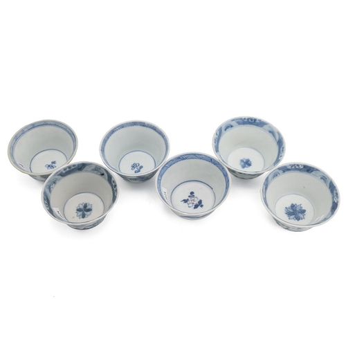 79 - SIX CHINESE BLUE AND WHITE TEACUPS, 18TH CENTURYThe bodies decorated in sprigs of flowers, five cups... 