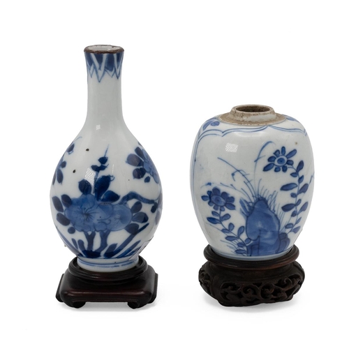 185 - TWO SMALL CHINESE BLUE AND WHITE VASES ON STANDS, KANGXI, 18TH CENTURYOne of baluster form, decorate... 